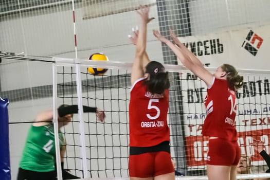 Volleyball professional Kseniya Pugach blocking