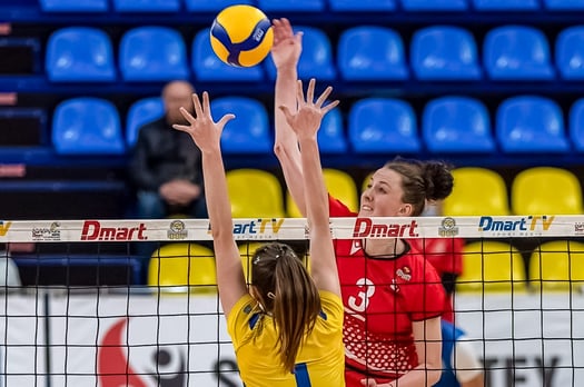 Volleyball professional Anastasiia Petrychenko blocking