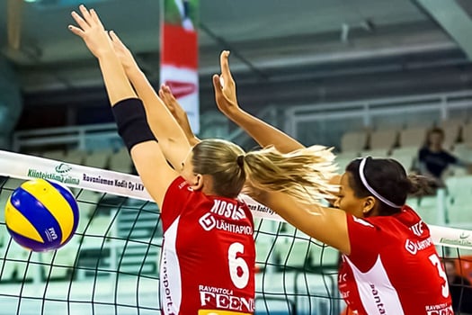 Volleyball professional Jessica Kosonen blocking